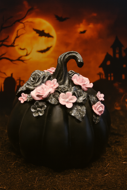 Elegant Black Resin Pumpkin with Pink Floral Accents